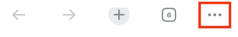The three-dot menu button at the bottom right of Chrome